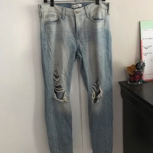 Light wash knee rip jeans